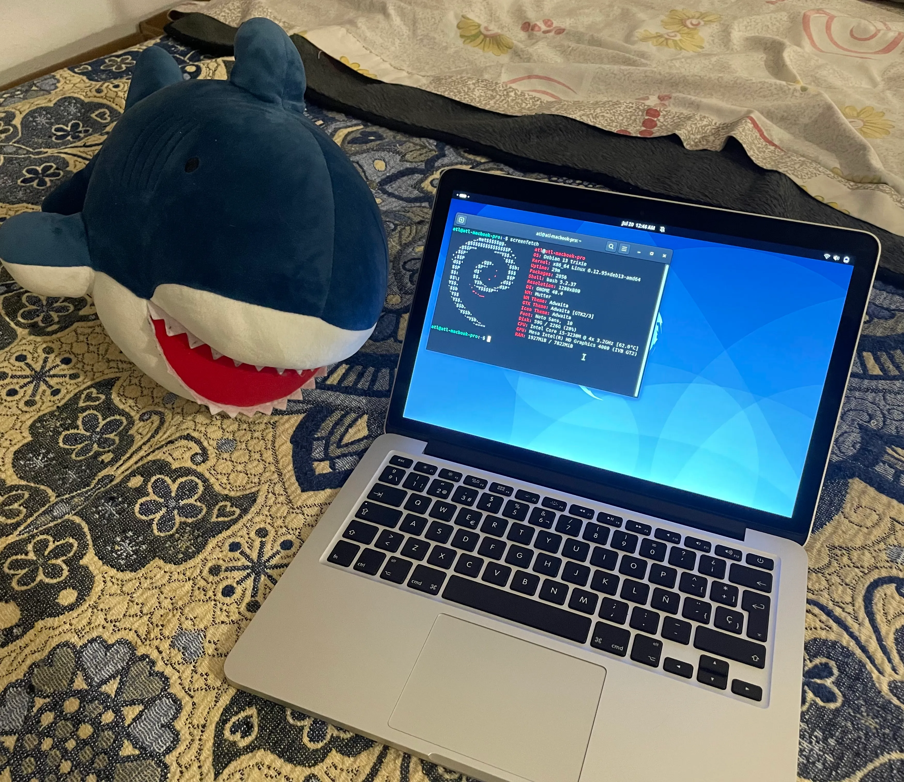 MacBook Pro and Shark.